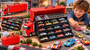 Red Race Car Transport Truck Display